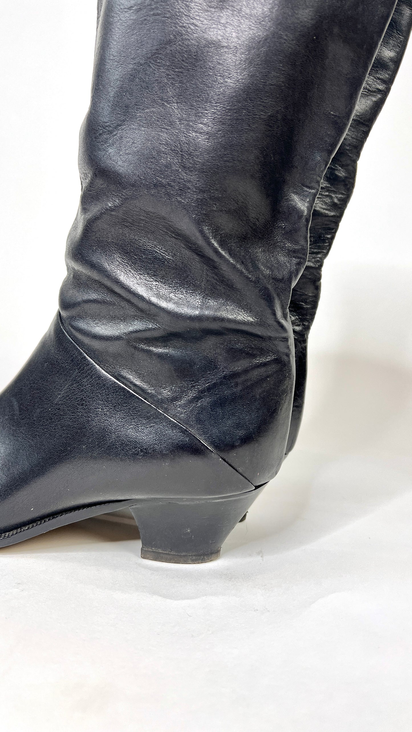 Black "Princess Diana" Knee High boot.